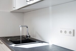 Réfrigérateur, four, plaque de cuisson, lave-vaisselle