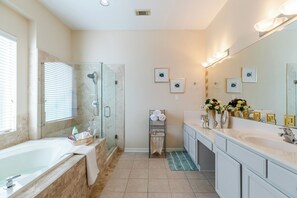 Jetted tub, hair dryer, towels, soap