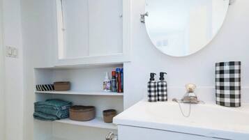 Hair dryer, towels, soap, toilet paper