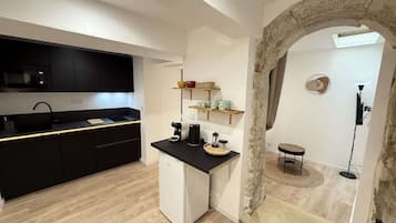 Fridge, microwave, coffee/tea maker, toaster