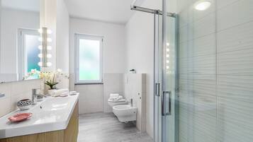 Family Apartment, Multiple Bedrooms, Beachside (Incanto Del Lago 50 Meters From Lake) | Bathroom | Shower, hair dryer, bidet, towels