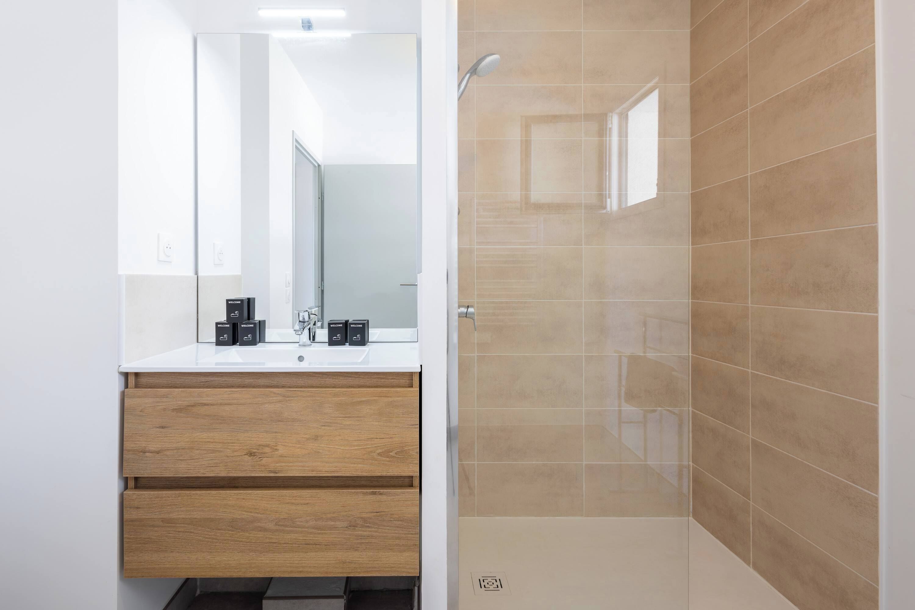 Shower, free toiletries, hair dryer, towels