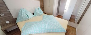 2 habitaciones y ropa de cama