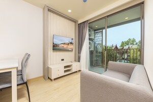 Apartment, Balcony, Garden View | Living area