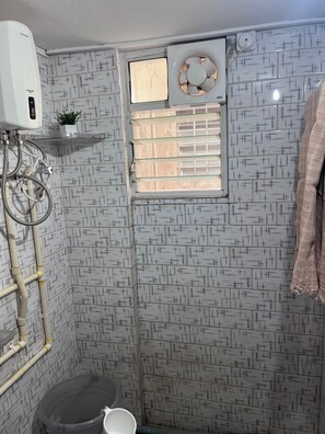 Bidet, towels, soap, toilet paper