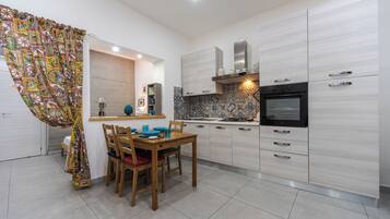 Apartment, 1 Bedroom | Private kitchen | Espresso maker, coffee/tea maker, full-sized fridge, microwave
