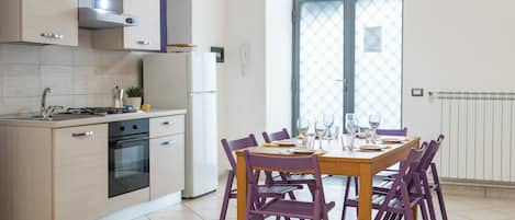 Apartment, 1 Bedroom | Private kitchen | Full-size fridge, oven, stovetop, cookware/dishes/utensils