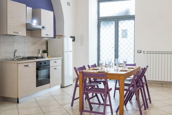 Apartment, 1 Bedroom | Private kitchen | Full-sized fridge, oven, stovetop, cookware/dishes/utensils