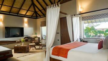 Premium bedding, down duvets, free minibar items, in-room safe
