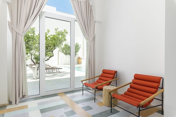 Classic Room | Living area | 30-inch TV with satellite channels