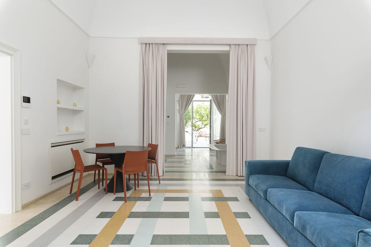 Chambre Classique | Coin séjour