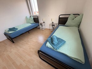 2 dormitorios, escritorio, tabla de planchar con plancha y wifi gratis