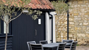 Dobbelt- eller tomannsrom – deluxe, terrasse | Terrasse/patio