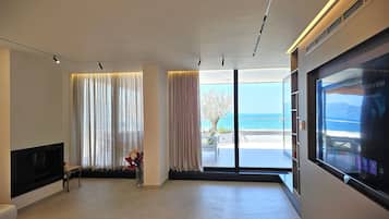 Cobertura exclusiva, vista para o mar | Área de estar