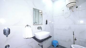 Shower, towels, soap, toilet paper