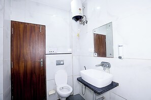 Shower, towels, soap, toilet paper