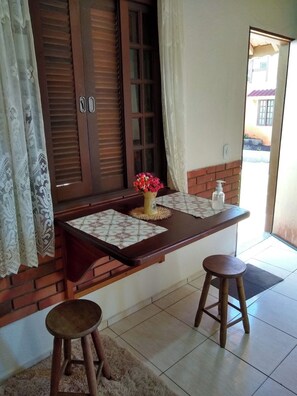 Basic Chalet, Garden View | Living area | TV