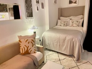 Desk, iron/ironing board, travel cot, free WiFi