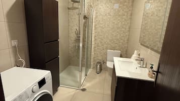 Hair dryer, towels, soap, shampoo
