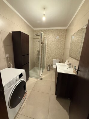 Hair dryer, towels, soap, shampoo