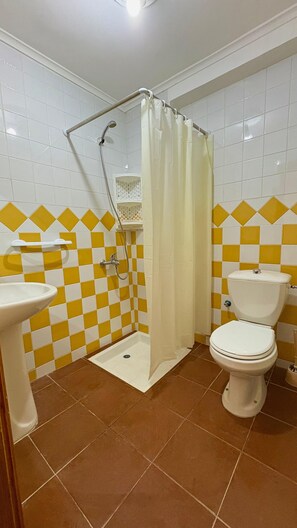 Shower, towels, soap, toilet paper