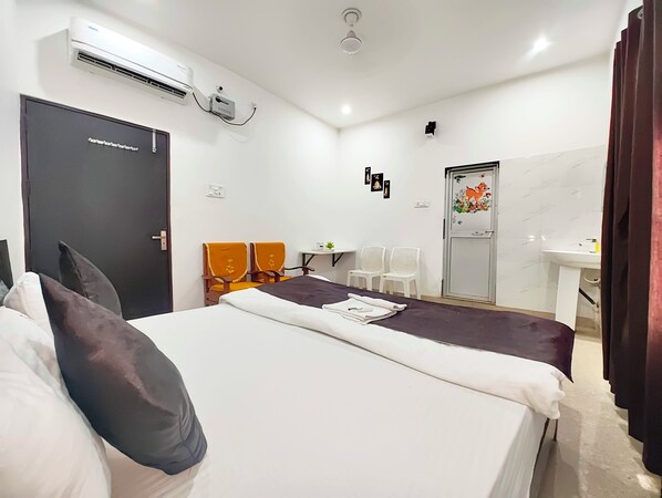 Literie hypoallergénique, coffres-forts dans les chambres, bureau