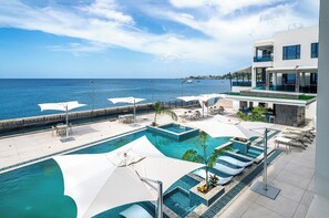 Outdoor pool, open 7:00 AM to 6:00 PM, pool umbrellas, pool loungers