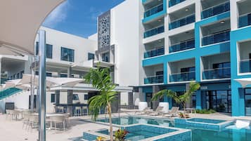 Outdoor pool, open 7:00 AM to 6:00 PM, pool umbrellas, pool loungers