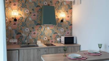 Studio, Balcony | Private kitchenette