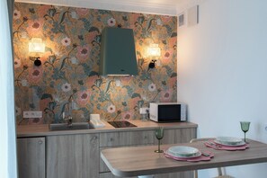 Studio, Balcony | Private kitchenette