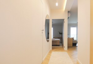 Apartamento, balcón | Zona de estar
