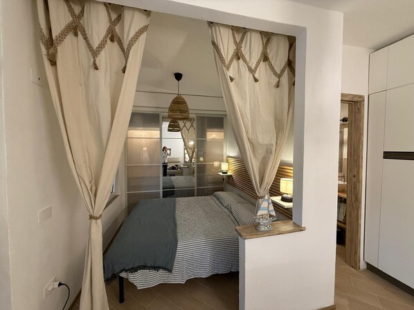 1 bedroom, bed sheets - Holiday Home 'Le Vele' with Shared Pool, Private Garden and Air Conditioning (Porto Istana)