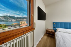 2 quartos, ferros/tábuas de passar roupa, Wi-Fi, roupa de cama