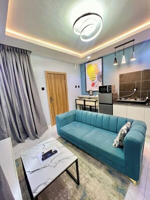 Family Apartment, Balcony, City View | Living area