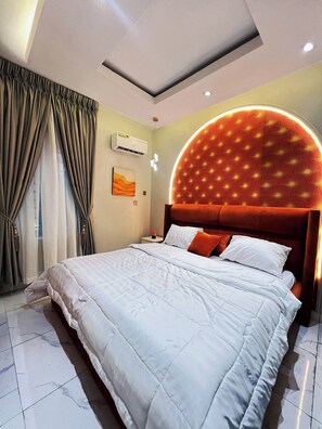 Family Apartment, Balcony, City View | In-room safe, desk, laptop workspace, blackout curtains - Crestville Apartments (Lagos)