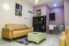 Økonomileilighet, balkong, byutsikt | Oppholdsområde