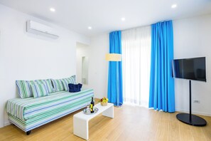 Deluxe Triple Room, Balcony, City View | Desk, laptop workspace, blackout drapes, iron/ironing board - Carlo III guest house (Naples)