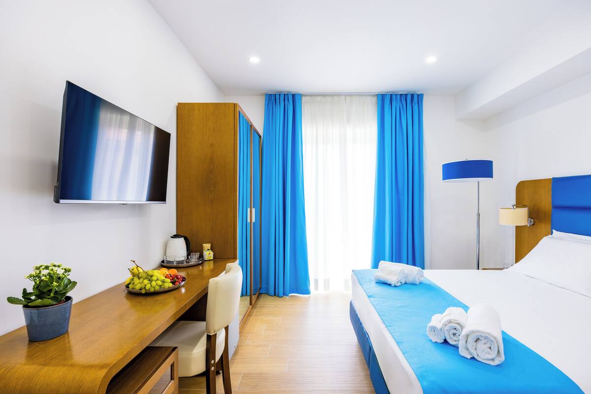 Superior Double Room, Balcony, City View | Desk, laptop workspace, blackout drapes, iron/ironing board