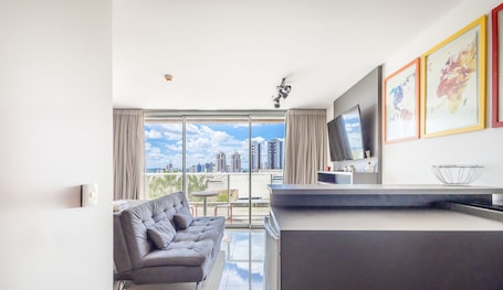 Basic Apartment | Living area | 32-inch Smart TV with digital channels