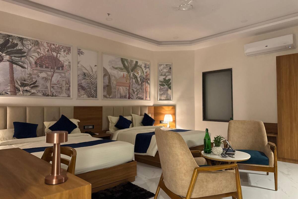 Family Suite, City View | Desk, laptop workspace, iron/ironing board, free WiFi