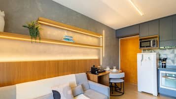 Basic Apartment | Living area | 32-inch Smart TV with digital channels
