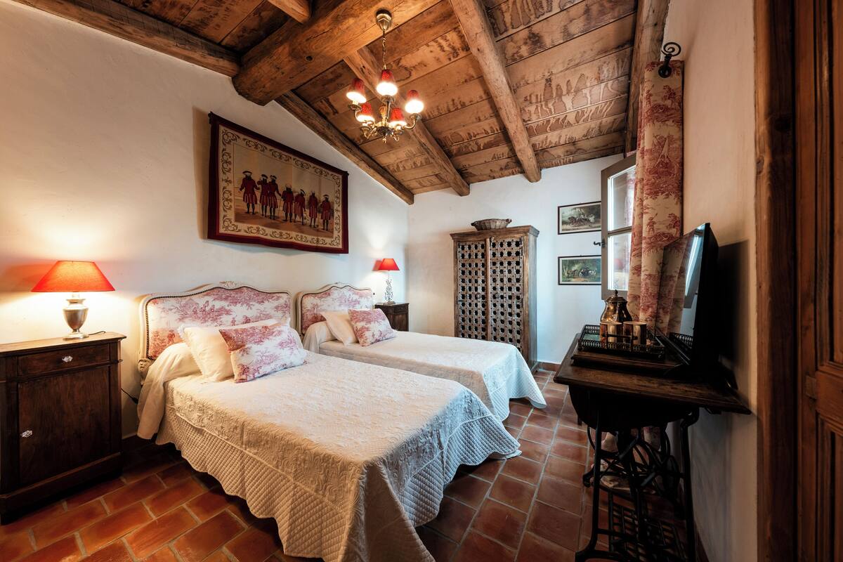 Twin Room, Garden View | Blackout drapes, free WiFi