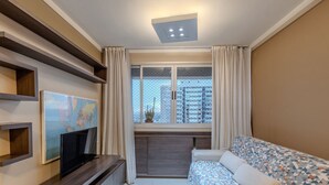 Basic Apartment | Living area | 32-inch Smart TV with digital channels - Luxury Penthouse w/ Jacuzzi in Brasilia Bcy2001 (Águas Claras)