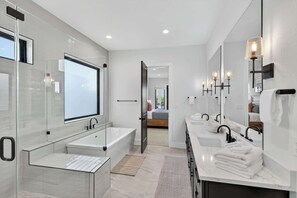 Shower, hair dryer, towels, shampoo