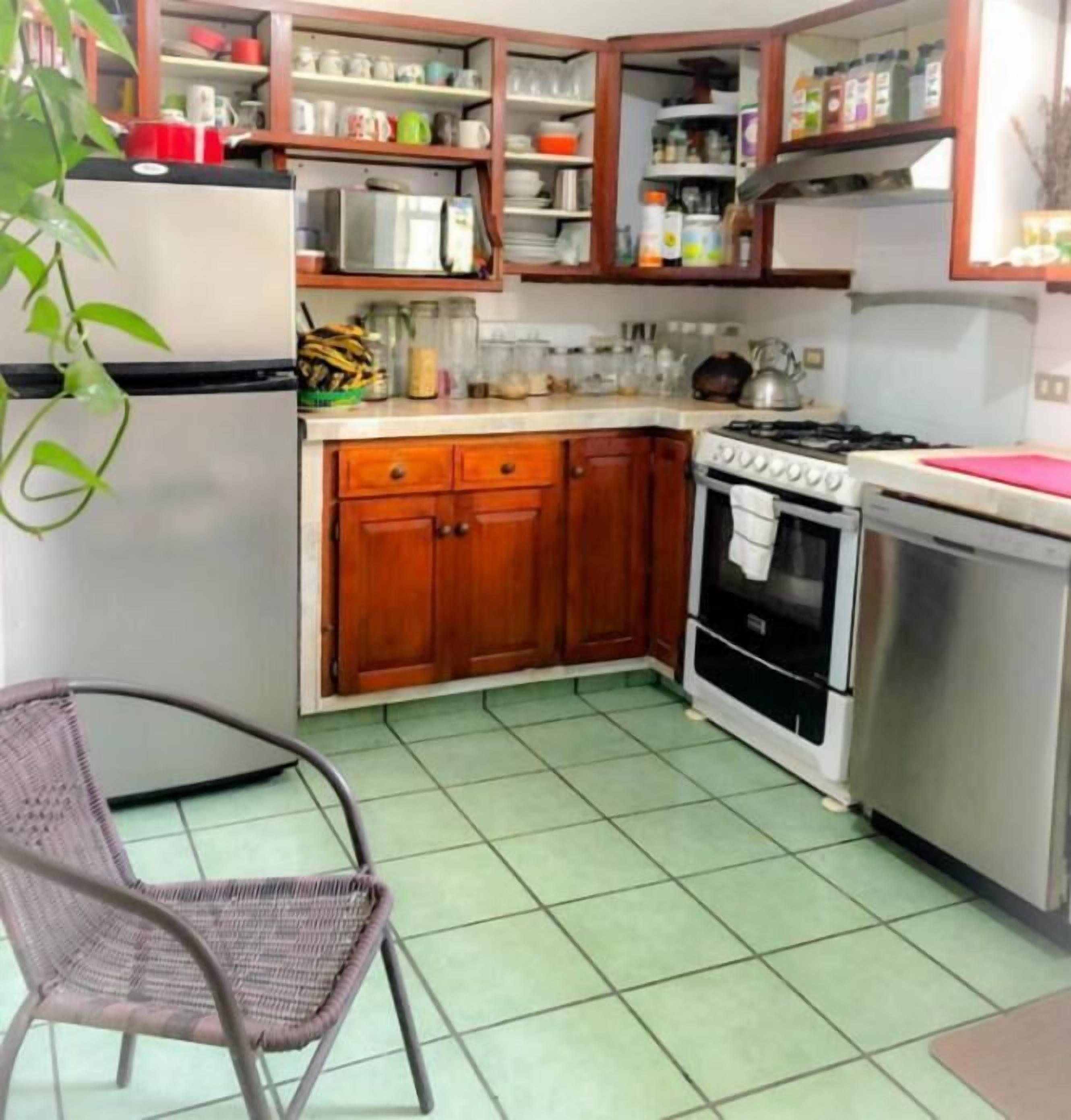Family Triple Room, Multiple Beds | Private kitchen | Shared fridge, microwave