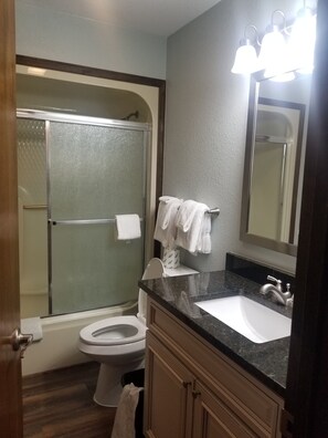 Shower, towels, soap, shampoo