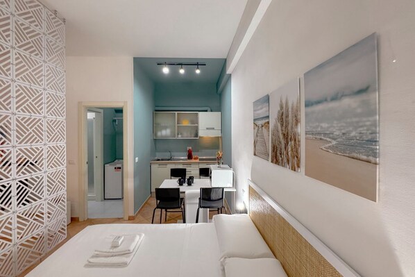 1 habitación, tabla de planchar con plancha, wifi gratis y ropa de cama 
