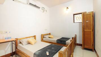 Deluxe Suite, 2 Bedrooms | Iron/ironing board, free WiFi, bed sheets