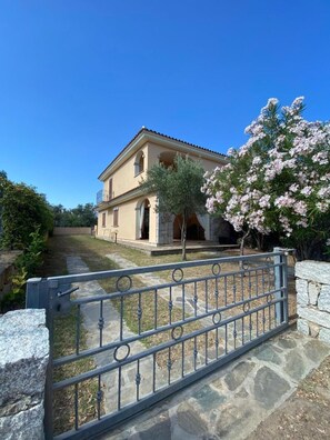 Apartment, 4 Bedrooms, Balcony, Garden View | Property grounds - Villa Praga San Teodoro (San Teodoro)