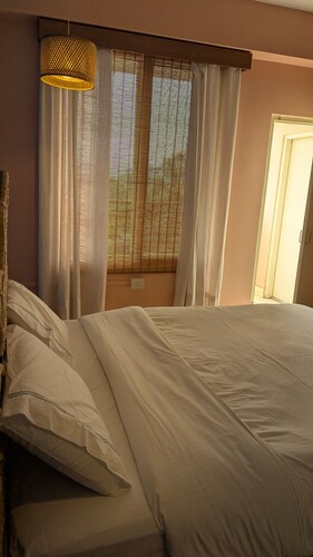 Seneh Homes - An Assamese homestay experience with WiFi, Views, & AC in Guwahati